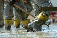 U.S. Airmen from the South Carolina Air National Guard’s 169th Civil Engineer Squadron at McEntire Joint National Guard Base, S.C., pour and level concrete foundations for multi-purpose buildings being constructed in support of a Deployment for Training in Israel, June 30, 2015.