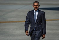 President Barack Obama walks toward a crowd after disembarking Air Force One at Joint Base Elmendorf-Richardson, Alaska, Monday, Aug. 31, 2015. President Obama was the main speaker at a major event yesterday in Anchorage, Alaska, hosted by the U.S. Department of State entitled the Conference on Global Leadership in the Arctic: Cooperation, Innovation, Engagement and Resilience (GLACIER). GLACIER will focus the world’s attention on the most urgent issues facing the Arctic today and provide an unprecedented opportunity for foreign ministers and key stakeholders to define the region’s most crucial challenges; highlight innovative ways in which these challenges can be addressed at the local, national and international levels; and broaden global awareness of the impacts of Arctic climate change. (U.S. Air Force photo/Justin Connaher). Original public domain image from Flickr