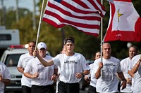 Airmen, Soldiers, and Sailors from Joint Base McGuire-Dix-Lakehurst, run through Galloway Township, N.J. as part of the 2015 New Jersey Run for the Fallen on Sept. 25. The event, which lasts from Sept. 23-27, includes the team running 188 miles, from the Cape May Lighthouse, to the Vietnam Memorial in Holmdel.