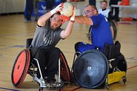 Wounded Warriors from all branches of the Armed Forces hone their rugby skills as they participate in All Service Rugby Training during Warrior Care Month 2015/Joint Services Wheelchair Rugby Exhibition at Joint Base Andrews, Maryland. Original public domain image from Flickr