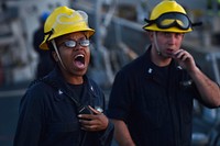 ROTA, Spain (Oct. 26, 2015) Boatswain's Mate 3rd Class Kernishia Jones shouts orders as petty officer in charge during sea and anchor detail aboard USS Ross (DDG 71) as the ship pulls into Naval Station Rota, Spain Oct. 26, 2015.