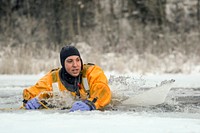 Cold Water/Ice Rescue TrainingFirefighters assigned to the 673rd Civil Engineer Squadron conduct cold water/ice rescue training at Joint Base Elmendorf-Richardson, Alaska, Dec. 20, 2015. (U.S. Air Force photo/Alejandro Peña). Original public domain image from Flickr