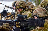 U.S. Army Soldiers, the Iron Troop, with 3rd Squadron, 2nd Cavalry Regiment, stationed out of Vilseck, Germany, supress the enemy with an assault attack during a live fire exercise at Tapa Training Area, Estonia, March 8-11, 2016.