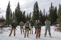 Air Force and Army military working dog handlers assigned to the 673d Security Forces Squadron and the 549th Military Working Dog Detachment conduct K-9 training at Joint Base Elmendorf-Richardson, Alaska, March 17, 2016. Military working dogs are trained to respond to various law enforcement emergencies as well as detect hidden narcotics and explosives. (U.S. Air Force photo/Alejandro Peña). Original public domain image from Flickr