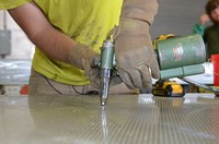 Civilian construction workers perform renovations on the South Carolina Air National Guard’s Enclosed Noise Suppression System Structure, or “hush house,” at McEntire Joint National Guard Base, S.C., March 10, 2016.