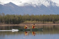 Wyoming Army National Guard Spc. Wyatt Schiermeyer, left, and South Dakota Army National Guard Spc. Bailey Ruff paddle their canoe to the next objective while competing in the National Guard Best Warrior Region VI 2018 at Joint Base Elmendorf-Richardson, Alaska, May 15, 2018. National Guard Best Warrior Region VI 2018 is a four-day competition that tests Soldiers' mental and physical toughness through a series of events that demonstrate technical and tactical proficiency to determine the top non-commissioned officer and junior enlisted Soldier. The competitors represent the top Soldiers from Alaska, Idaho, Montana, North Dakota, Oregon, South Dakota, Washington, and Wyoming. (U.S. Air Force photo by Alejandro Peña). Original public domain image from Flickr