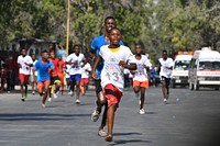 Residents of Mogadishu, Somalia, participate in the Mini-Marathon to mark the International Day of Sport for Development and Peace, which recognises the power of sport in promoting peace and erasing cultural barriers worldwide, on 6 April 2018. UN Photo / Omar Abdisalan. Original public domain image from Flickr