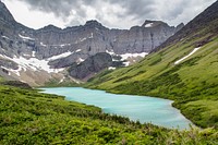 Cracker Lake surrounded by greenery mountains. Original public domain image from <a href="https://www.flickr.com/photos/glaciernps/28108940035/" target="_blank">Flickr</a>