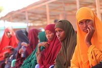 Delegates wait to cast votes for their candidates during the electoral process to choose members of the Lower House of the Federal Parliament in Kismaayo, Somalia on November 13, 2016. UN Photo / Awil Abukar. Original public domain image from Flickr