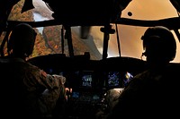 A South Carolina Army National Guard CH-47 Chinook heavy-lift cargo helicopter assigned to Detachment 1, Company B, 2-238th General Support Aviation Battalion and crew based in Greenville, South Carolina support the South Carolina Forestry Commission to contain a remote fire near the top of Pinnacle Mountain in Pickens County, South Carolina, Nov. 17, 2016.