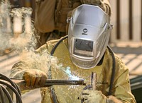 U.S. Marines and Soldiers assigned to Special Purpose Marine Air-Ground Task Force 7 fortify border fencing along the southwest border on Nov. 11, 2018.