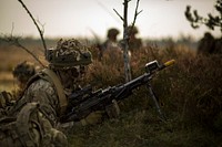 ADAZI MILITARY BASE, Latvia - A British soldier with the Queens Company of the Royal British Army's Grenadier Guards, provides security, Oct. 20, 2016, as part of Exercise Silver Arrow 2016.