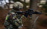 Tech. Sgt. Jeffery Self, 8th Security Forces Squadron team member, advances toward opposing forces during a training scenario at Kunsan Air Base, Republic of Korea, March 7, 2017.