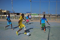 Somali youth play soccer at the Mogadishu One-Stop Centre. This was during a ceremony to mark International Sports Day for development and peace in Mogadishu on April 06, 2017. UN Photo / Ilyas Ahmed. Original public domain image from Flickr