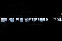 BLACK SEA– Sailors aboard the Arleigh Burke-class guided-missile destroyer USS Oscar Austin (DDG 79) navigate the ship while entering the port of Constanta, Romania, May 11, 2017.