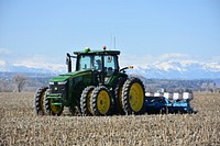 Brian Kindsfather plants no-till sugar beets into corn residue on his farm near Laurel, Mont. Yellowstone County. April 2018. Original public domain image from Flickr