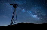 Milky way over a wind turbine. Original public domain image from Flickr