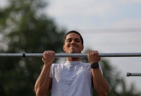 A U.S. Air Force airman from the New Jersey Air National Guard's 108th Wing does the flex arm hang during a German Armed Forces Badge for Military Proficiency test at Joint Base McGuire-Dix-Lakehurst, N.J., June 13, 2017.