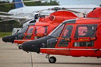 U.S. Coast Guard HH-65C Dolphin helicopters from Coast Guard Air Station Atlantic City are prepared for a mission during a three-day Aeropsace Control Alert CrossTell live-fly training exercise at Atlantic City International Airport, N.J., May 24, 2017. Representatives from the Air National Guard fighter wings, Civil Air Patrol, and U.S. Coast Guard rotary-wing air intercept units will conduct daily sorties from May 23-25 to hone their skills with tactical-level air-intercept procedures. (U.S. Air National Guard photo by Master Sgt. Matt Hecht/Released). Original public domain image from Flickr