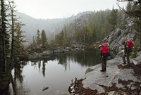 Hikers at lake in lower Enchantments, Alpine Lakes Wilderness, Wenatchee Nat'l Forest 1968. Original public domain image from Flickr