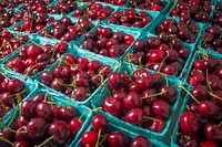 Vender sweet cherries at the U.S. Department of Agriculture (USDA) farmers market at the USDA headquarters in Washington, D.C., June 2, 2017. USDA photo by Preston Keres. Original public domain image from Flickr