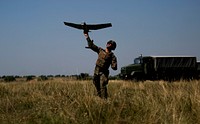 MYKOLAYIVKA, Ukraine (July 19, 2017) A U.S. Marine with Black Sea Rotational Force 17.1 launches an unmanned aerial vehicle during exercise Sea Breeze 2017 in Mykolayivka.