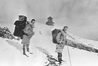 Two unidentified people taking up supplies to lookout. Original public domain image from Flickr