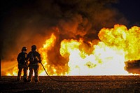 U.S. Air Force firefighters battle a controlled fuel burn during exercise Patriot Warrior at Sparta/Fort McCoy Airport, Wisconsin, Aug. 11, 2017.