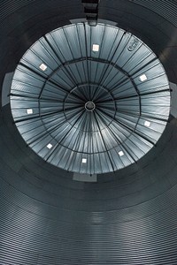 Grain bins often serve as visitor centers for some exhibitors at the Farm Progress Show, in Decatur, IL, on Aug 29, 2017. USDA Photo by Lance Cheung. Original public domain image from Flickr