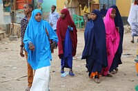 Worshipers leave the local mosque in Beletweyne, Somalia at the end of Eid-Al-Adha prayers on September 01, 2017. AMISOM Photo. Original public domain image from Flickr