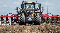 U.S. Department of Agriculture (USDA) Secretary Sonny Perdue tours the Farm Progress Show and takes wheel of a new tractor, in Decatur, IL, on Aug 30, 2017. USDA Photo by Lance Cheung. Original public domain image from Flickr