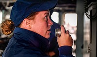 ARCTIC CIRCLE (Sept. 3, 2017) Boatswain&#39;s Mate 3rd Class Janna LaNier makes an an announcement on the shipboard general announcing system aboard the Arleigh Burke-class guided-missile destroyer USS Oscar Austin (DDG 79), Sept. 3, 2017.