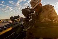 U.S. Marine Corps Cpl. Tyler Morrow, a rifleman with Company B, 1st Light Armored Reconnaissance Battalion, 1st Marine Division, preforms a functions check on his M240 machine gun during Deep Strike II in the River Valley, Calif., Sept. 13, 2017.
