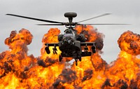 A Royal Air Force WAH-64D Apache helicopter demonstrates its combat capabilities for spectators during the 2017 Royal International Air Tattoo (RIAT) at RAF Fairford, England, United Kingdom, on July 16, 2017.