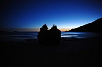 Marines attached to 3rd Battalion, 5th Marine Regiment, 31st Marine Expeditionary Unit stand on top of their AAV-7A1 Amphibious Assault Vehicle after an amphibious landing on Fresh Water Beach at the Shoalwater Bay Training Facility in the Queensland, Australia, during exercise Talisman Sabre, July 15.