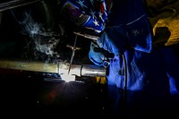 New Jersey Army National Guard Spc. Timothy Gallagher performs a weld during the Allied Trade Specialist Course at the New Jersey National Guard's Regional Training Site-Maintenance on Joint Base McGuire-Dix-Lakehurst, N.J., Sept. 13, 2017. Original public domain image from Flickr