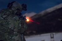 An Airman assigned to the 3rd Air Support Operations Squadron, fires an M4 carbine during night live-fire sustainment training at Joint Base Elmendorf-Richardson, Alaska, Nov. 29, 2017. During the night live-fire training exercise, the 3rd ASOS Airmen honed their marksmanship skills, transitioning between firing the M9 pistol and M4 carbine. (U.S. Air Force photo by Alejandro Peña). Original public domain image from Flickr