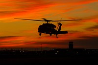 After spending the day of dropping water on the Thomas Fire in Ventura County, California, a UH-60 Black Hawk helicopter from the California Army National Guard's B Company, 1st Battalion, 140th Aviation Regiment, takes off from Camarillo Airport in Camarillo, California, Sat., Dec. 9, 2017, to return to Joint Forces Training Base Los Alamitos.