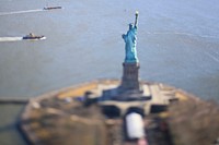 An aerial view of the Statue of Liberty, on Liberty Island in New York Harbor, as seen from a New Jersey National Guard UH-60L Black Hawk helicopter. Original public domain image from Flickr
