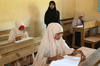 Secondary students take the national examinations in Kismaayo, Somalia, on 22 May 2018. Over 27,000 secondary school students in Somalia began national examinations on Saturday. The exams will be conducted in 120 centers across the capital and four federal states that include Galmudug, Hirshabelle, Southwest, and Jubbaland. UN Photo. Original public domain image from Flickr