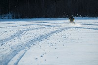 Fishermen often use snowmobile, ice auger and a depth finder to fish on Bass Lake in the U.S. Department of Agriculture (USDA) Forest Service (FS) Superior National Forest (NF) in Minnesota, on Feb 28, 2018, fun was had, but, the fish were all were too small to keep and returned to the lake.