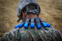 A U.S. Army Soldier from the New Jersey National Guard’s D Company, 1st Battalion, 114th Infantry Regiment prepares to load a Mk 19 grenade launcher with 40mm M385 practice grenades during training on Joint Base McGuire-Dix-Lakehurst, N.J., July 26, 2018. Original public domain image from Flickr