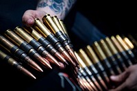 MEDITERRANEAN SEA. Culinary Specialist 3rd Class Dyllan Beard, assigned to the Arleigh Burke-class guided-missile destroyer USS Porter (DDG 78), prepares ammunition for a crew-served weapons qualification course April 4, 2018.