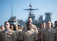 NORTH SEA (May 27, 2018) Sailors stand in formation on the flight deck during an all-hands call aboard the Harpers Ferry-class dock landing ship USS Oak Hill (LSD 51) May 27, 2018.