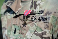 3 Geronimo Award CeremonyParatroopers assigned to the 3rd Battalion, 509th Parachute Infantry Regiment, 4th Infantry Brigade Combat Team (Airborne), 25th Infantry Division, U.S. Army Alaska, participate in an award ceremony held at Pershing Field, Joint Base Elmendorf-Richardson, Alaska, June 7, 2018. The ceremony recognized the sacrifices and achievements of the Soldiers of 3 Geronimo during their recent 9 month combat deployment to Afghanistan. (U.S. Air Force photo by Alejandro Peña). Original public domain image from Flickr