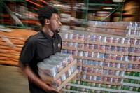 Food is prepared for distribution at FeedMore, one of U.S. Department of Agriculture's (USDA) partner agencies, located in Richmond, Virginia, providing food assistance as part of the Commodity Supplemental Food Program (CSFP) and The Emergency Food Assistance Program (TEFAP).