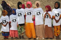 Children attend a ceremony to mark the International Day of the African Child in Kismaayo, Somalia on June 18, 2018. AMISOM Photo. Original public domain image from Flickr