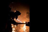 Fighterfighters battle a blaze during live burn training at the Anthony "Tony" Canale Training Center in Egg Harbor Township, N.J., Sept. 18, 2018.