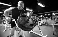 Cpl. John Smurr, a senior Marine Corps body bearer, works out his back muscles during an off day, Nov. 24, 2009.