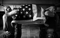 Marine Corps body bearers run through a practice funeral Nov. 25, 2009 before preparing for the days funerals.